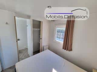Mobils Diffusion - Mobil-home d’occasion – Trigano Amira – 3 chambres, 2 salles d’eau, clim